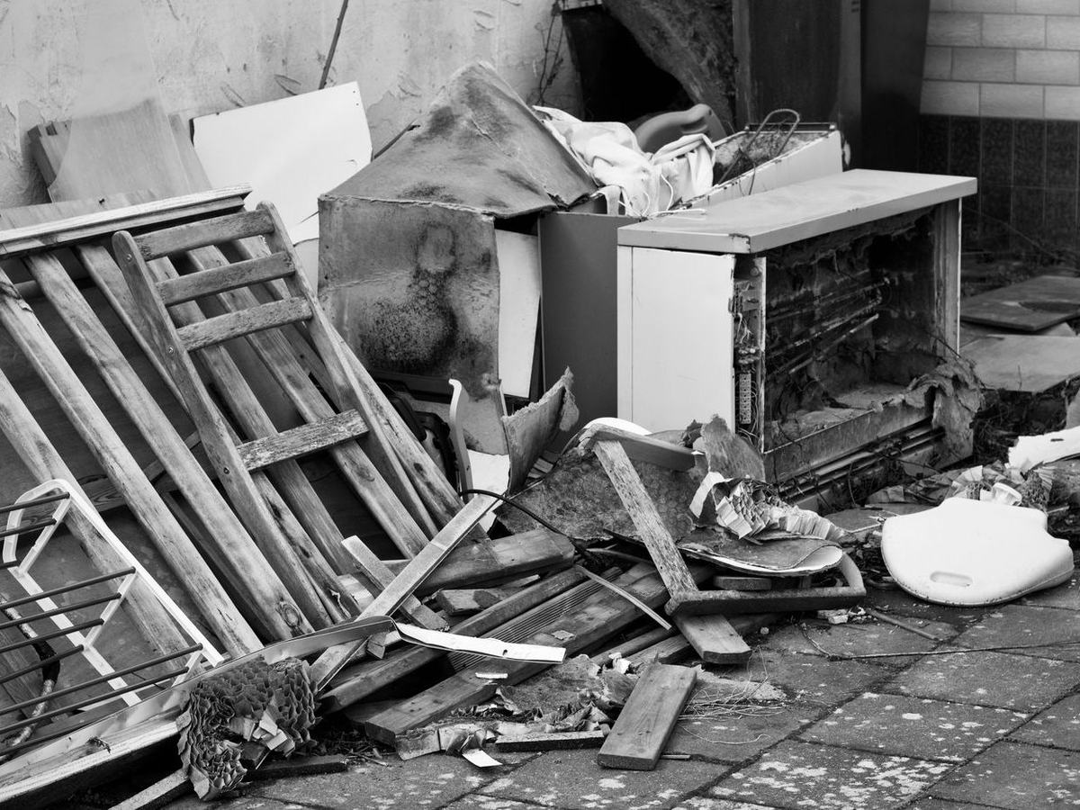 Household debris ready for dumpster pickup